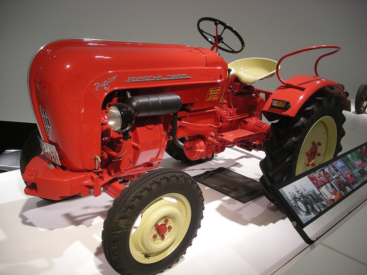 Porsche-Diesel Junior displayed in the Porsche Museum, photographed on 11 July 2012. This later tractor illustrates the agricultural lineage, not a personally completed design by Ferdinand Porsche.